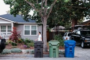 Property owners in an HOA are responsible for adhering to the community’s trash pickup schedule