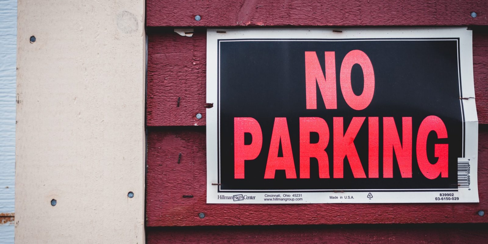 Sign in red - No Parking - rule enforcement in Homeowners Association